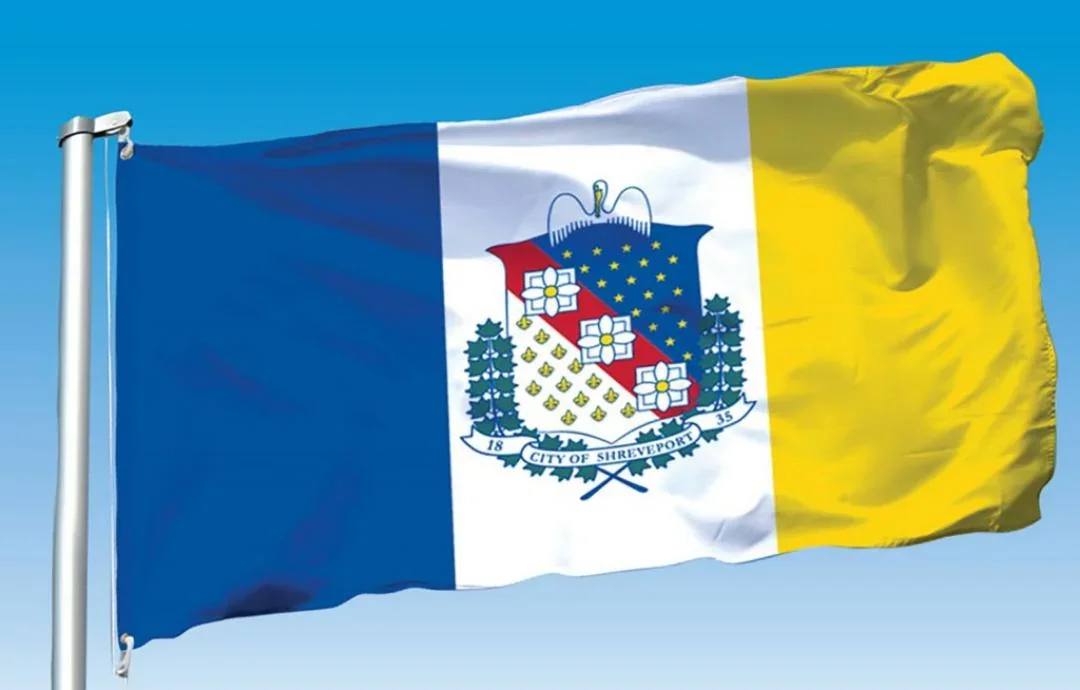The modernized Shreveport flag waving on a pole