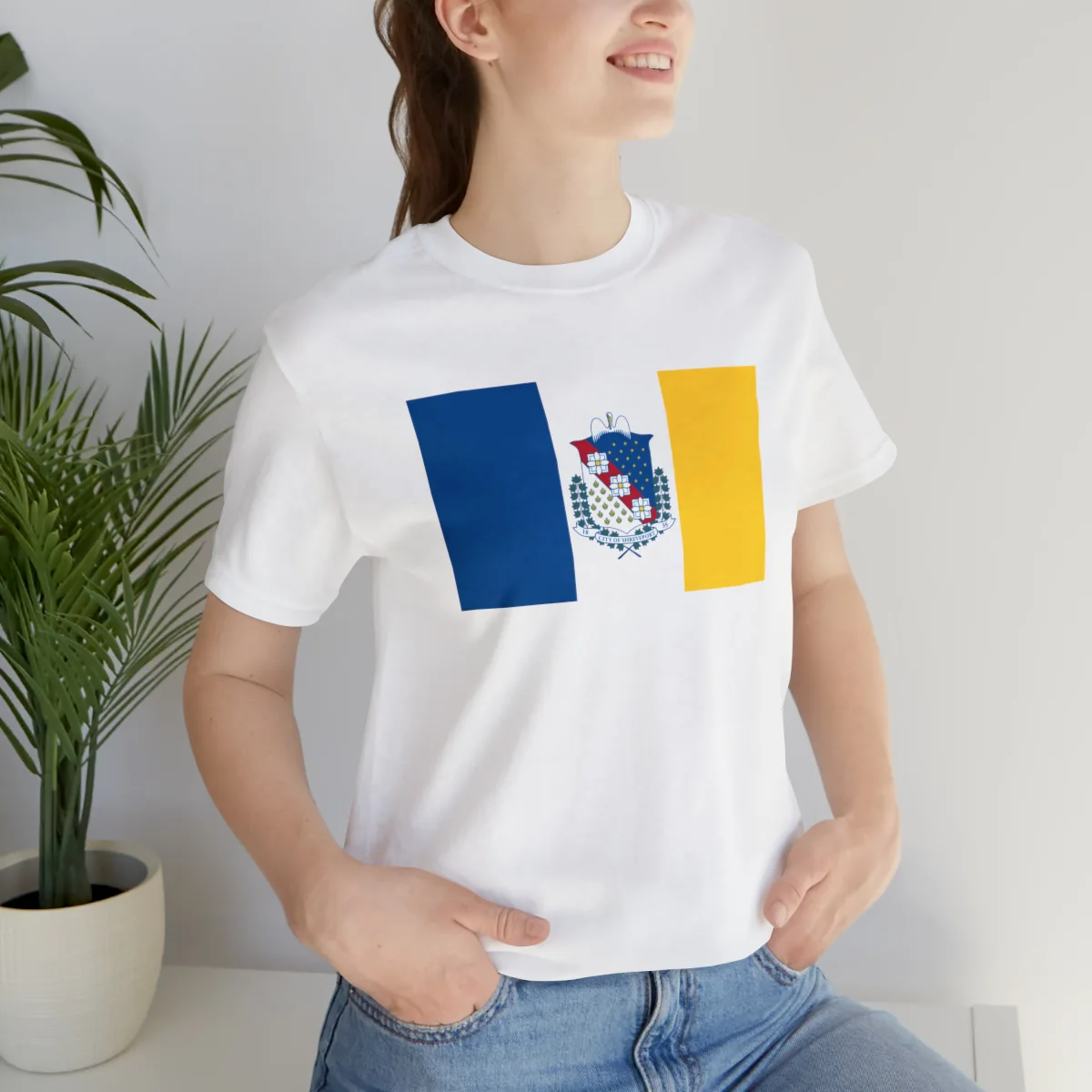 Woman wearing a Shreveport flag tee